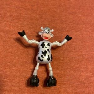 Wind up dancing cow